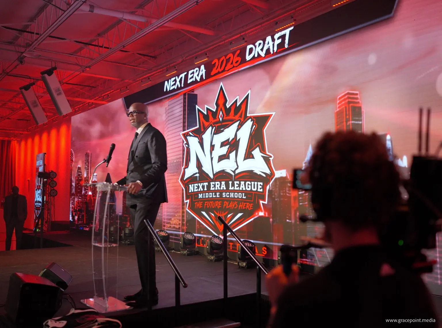 The Next Era League Draft stage being filmed during the opening address
